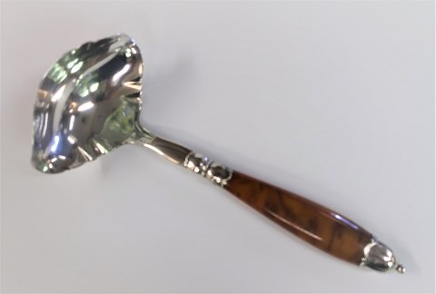 Silver sauce spoon with art amber. (830). Length 20 cm. Produced 1928
