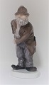 Bing & Grondahl. Porcelain figure. Sofus vagabond. Model 2473. Height 20. (1 
quality)