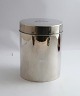 Emil Ferdinand Dahl (F. Dahl). Silver tea can (830). There is a coat of arms 
engraved on the lid. Height 12.5 cm. Diameter 9.5 cm. Produced 1864