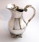 Svend Toxværd. Sterling silver pitcher with grapes, hammered. Height 22 cm.