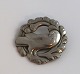 Georg Jensen. Broche med due i sterling sølv (925). Diameter 4 cm.